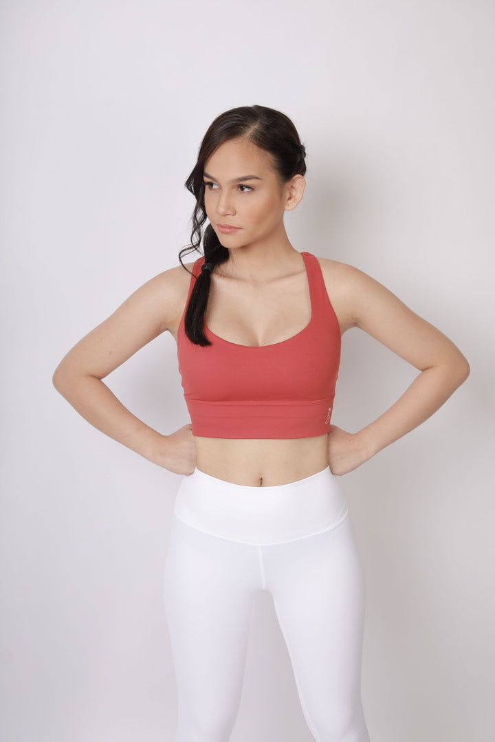 A lady wearing Beauty Lyfe Activewear Charm Model White leggings and in sports bra